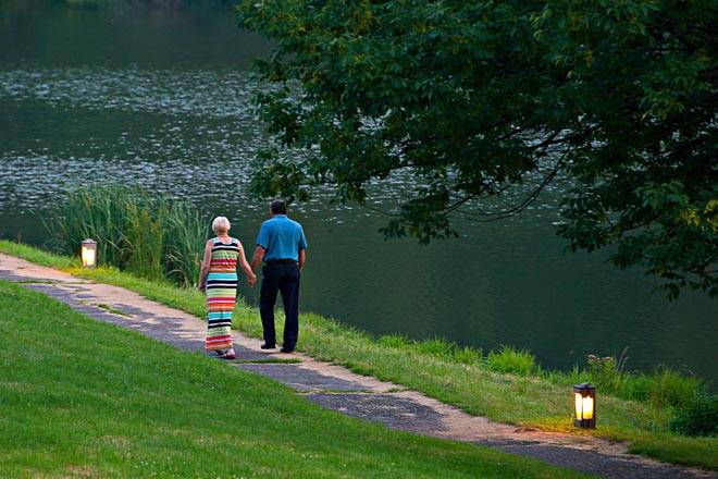 Couple Walking on Path by the Lake