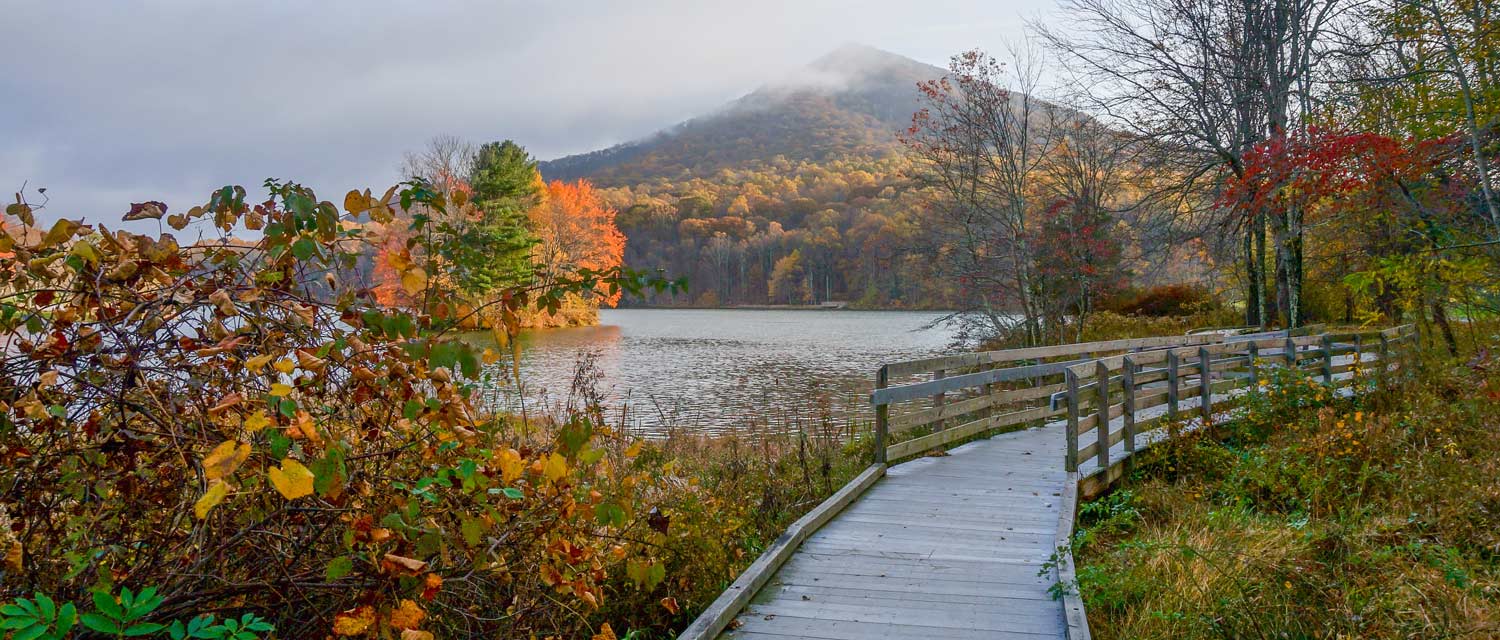 A view of Abbott Lake and Sharp Top Mountain in fall