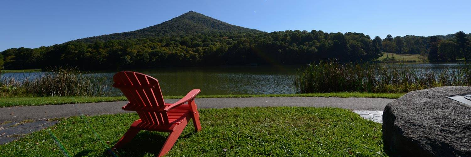 Red Adirondack Chair With View of Sharp Top Mountain - Peaks of Otter Ldoge